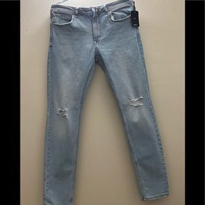 New Forever 21 jeans,slim,light wash blue, distressed